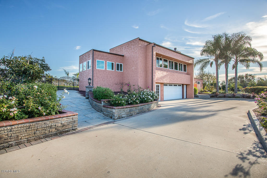 3774 Groves Place Somis, CA 93066 - Photo 35 of 51 a front view of a house with a yard and potted plants