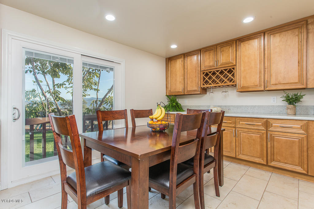 3774 Groves Place Somis, CA 93066 - Photo 7 of 51 a kitchen with stainless steel appliances granite countertop a table and chairs in it