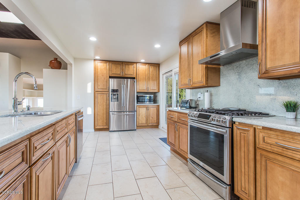 3774 Groves Place Somis, CA 93066 - Photo 8 of 51 a kitchen with stainless steel appliances granite countertop a stove a sink dishwasher and a refrigerator