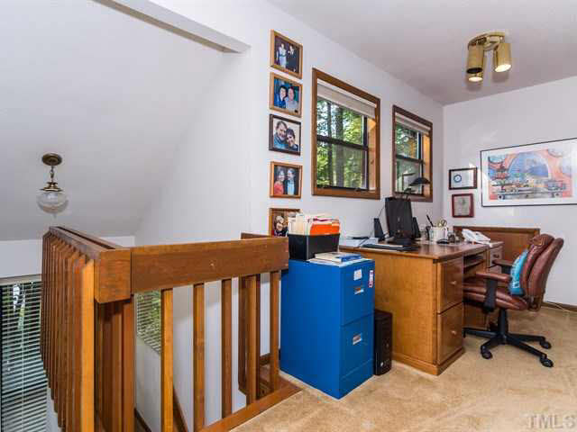 1212 Stone Creek Way Raleigh, NC 27615 - Photo 15 of 25 The built in shelves allow for a great office space or reading nook!