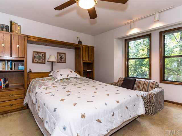 1212 Stone Creek Way Raleigh, NC 27615 - Photo 16 of 25 The master bedroom Is located on the 2nd floor with the loft, providing a private space for the homeowners.