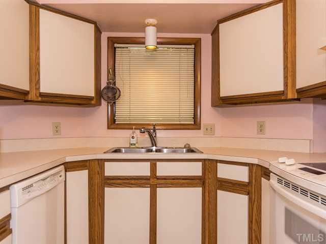 1212 Stone Creek Way Raleigh, NC 27615 - Photo 9 of 25 Large window above the double sink.