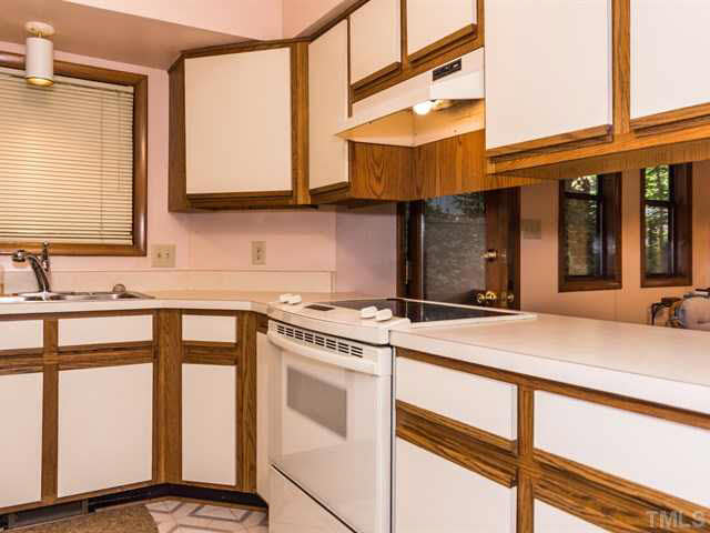 1212 Stone Creek Way Raleigh, NC 27615 - Photo 10 of 25 The kitchen opens to the breakfast room. Great utilization of space.