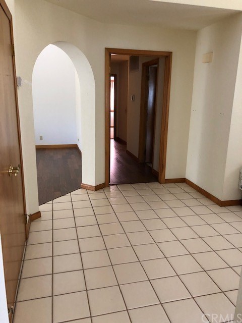 1768 Rambouillet Road Paso Robles, CA 93446 - Photo 6 of 23 Entry at right; hallway to two bedrooms; family room through archway.