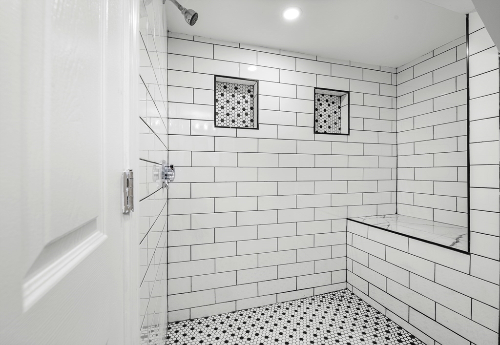 102 Hathaway Circle Arlington, MA 02476 - Photo 15 of 38 a bathroom with a shower