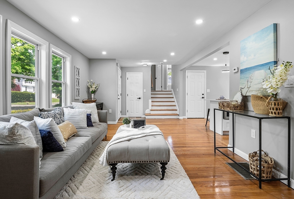 102 Hathaway Circle Arlington, MA 02476 - Photo 24 of 38 a living room with furniture and a table