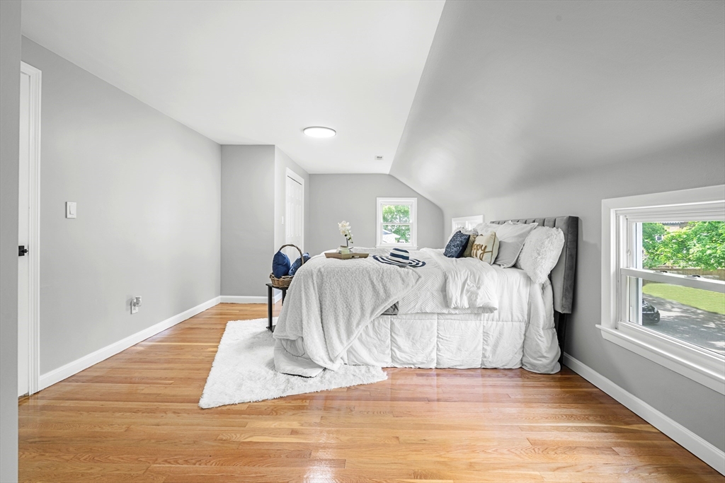 102 Hathaway Circle Arlington, MA 02476 - Photo 34 of 38 a large white bed in a white room