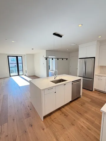 a large white room with a large window