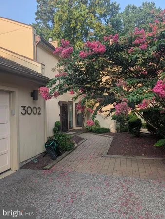 a front view of a house with yard