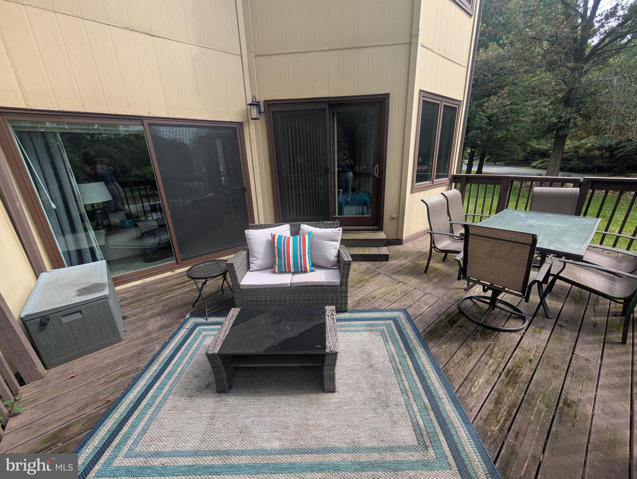 3002 Courtside Road Bowie, MD 20721 - Photo 25 of 48 a patio with patio couch and wooden floor