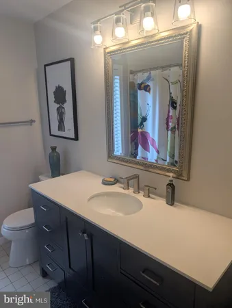 a bathroom with a shower and a tub