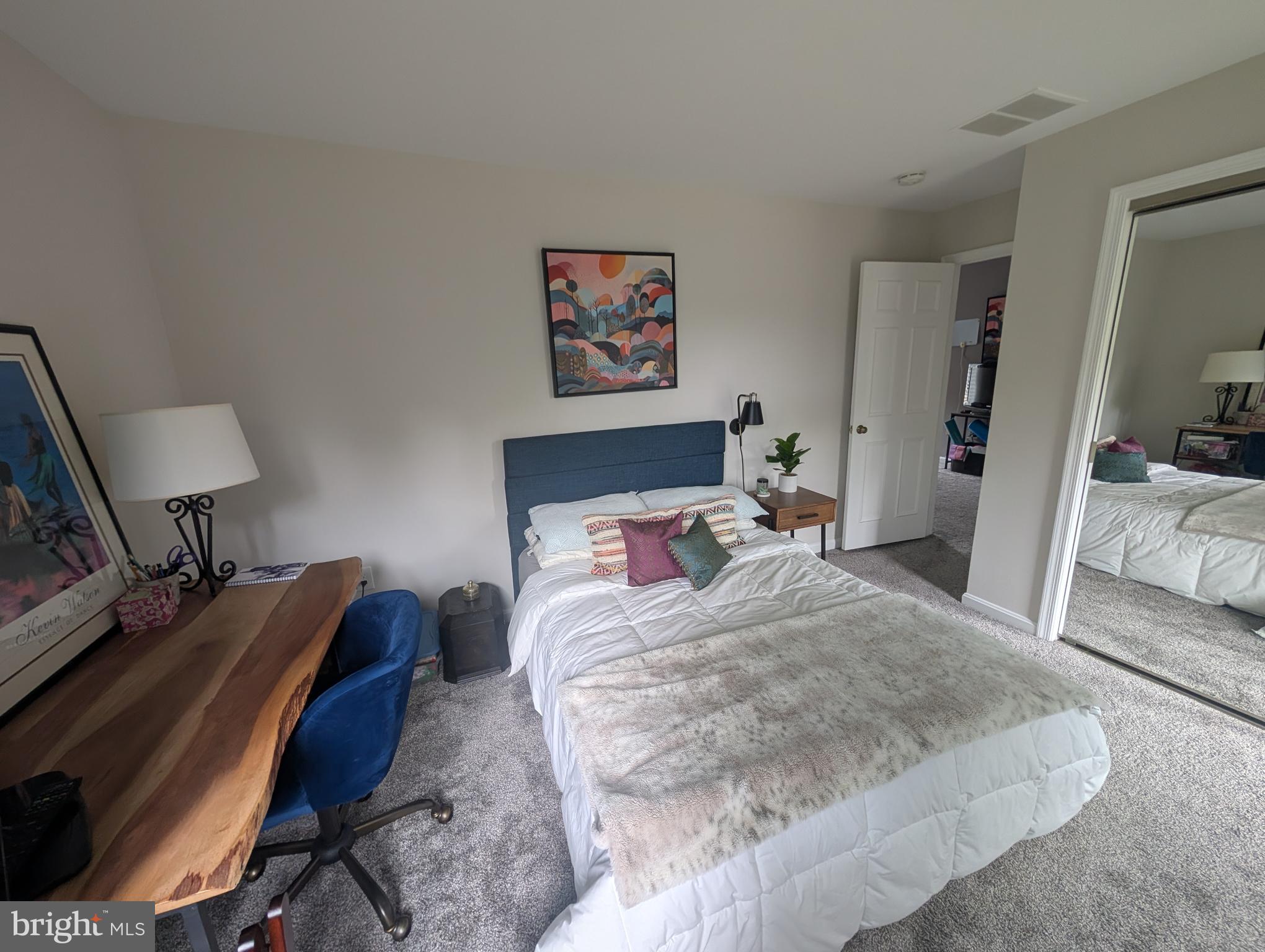 3002 Courtside Road Bowie, MD 20721 - Photo 32 of 48 a bedroom with a bed a couch and dresser
