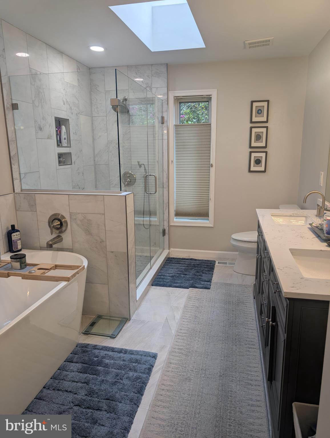 3002 Courtside Road Bowie, MD 20721 - Photo 38 of 48 a spacious bathroom with a tub sink a toilet and a shower