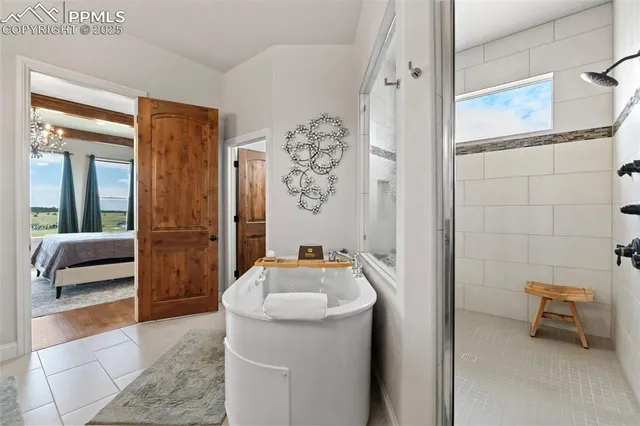 a en suite bathroom with a sink and a mirror