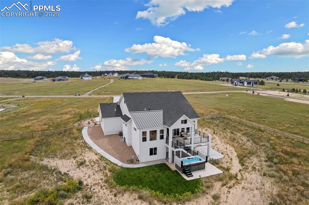 11726 Rambling Road Colorado Springs, CO 80908 - Photo 8 of 50 a view of a lake with a big yard