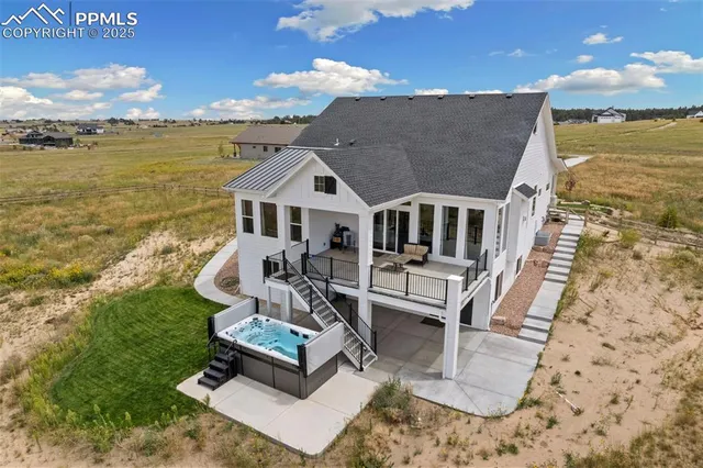a front view of a house with a ocean view