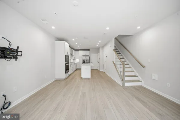 a view of entryway with wooden floor