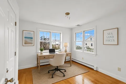 a workspace with wooden floor
