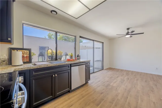 a kitchen with sink and window