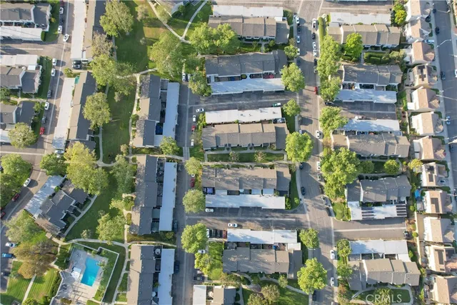 a view of a large building with a yard