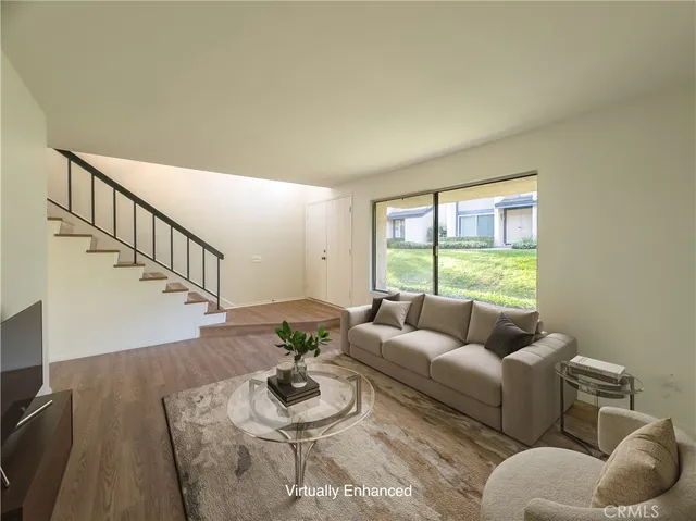 a living room with furniture and a table