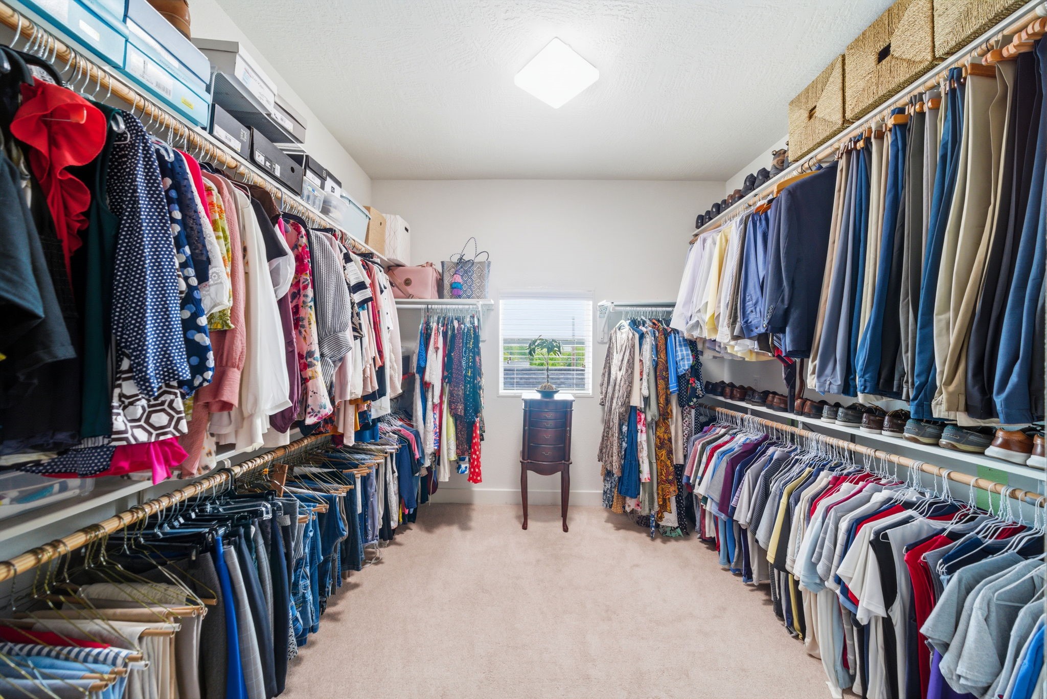 1910 Fletcher Street Houston, TX 77009 - Photo 30 of 34 Spacious primary closet with natural light, built-in shelves and tons of storage space.