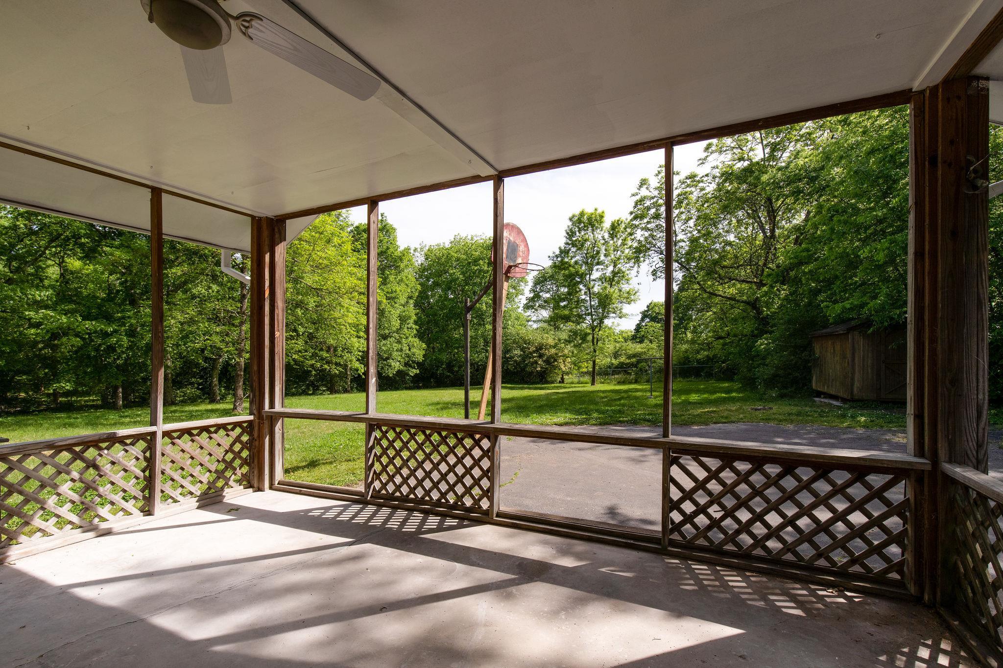 1008 Neelys Bend Road Madison, TN 37115 - Photo 21 of 26 a view of a yard and porch