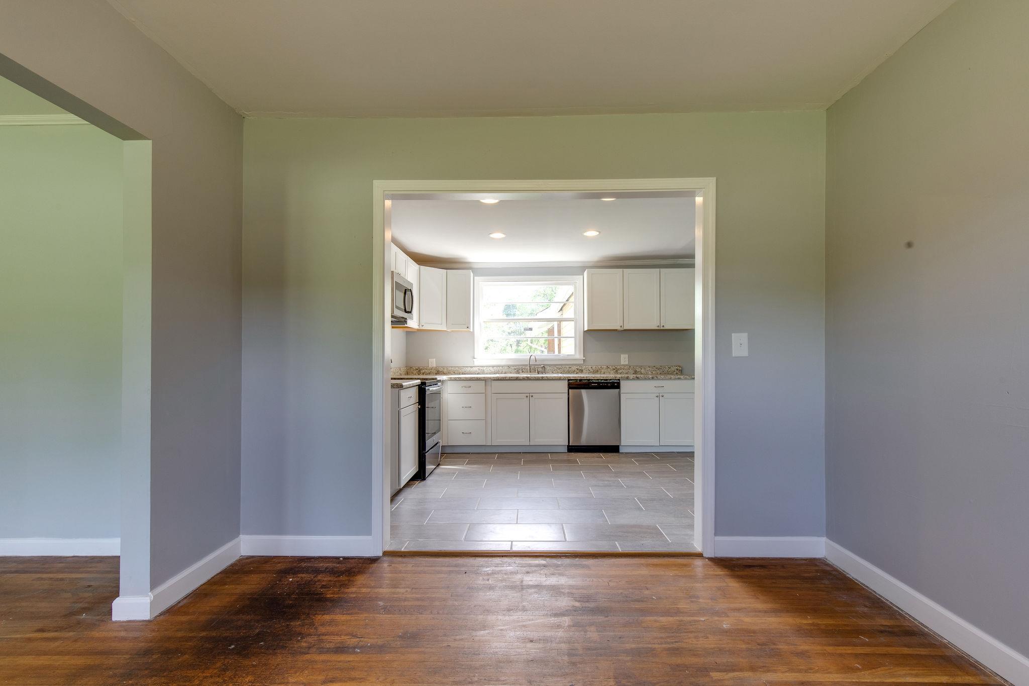 1008 Neelys Bend Road Madison, TN 37115 - Photo 6 of 26 a view of kitchen with furniture and wooden floor