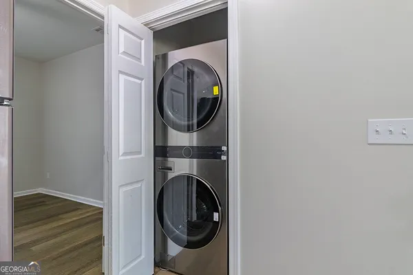 a close up view of a washer and dryer in a utility room