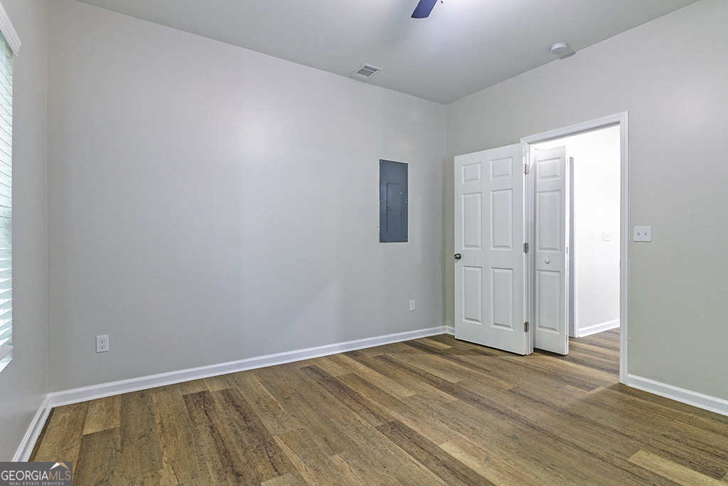 789 Main Street Macon, GA 31217 - Photo 8 of 19 wooden floor in an empty room