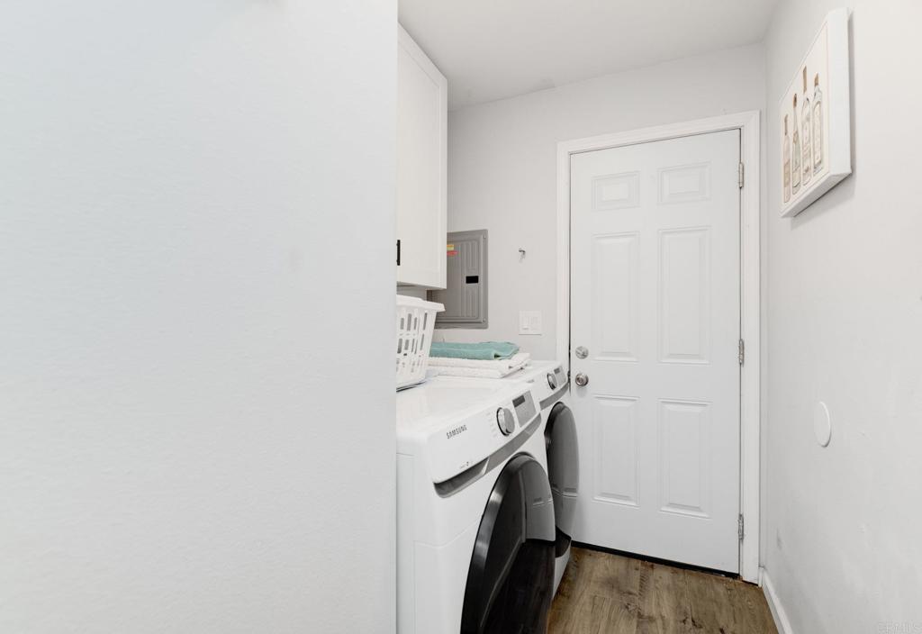 611 San Juhn Street Spring Valley, CA 91977 - Photo 16 of 25 a utility room with dryer and washer