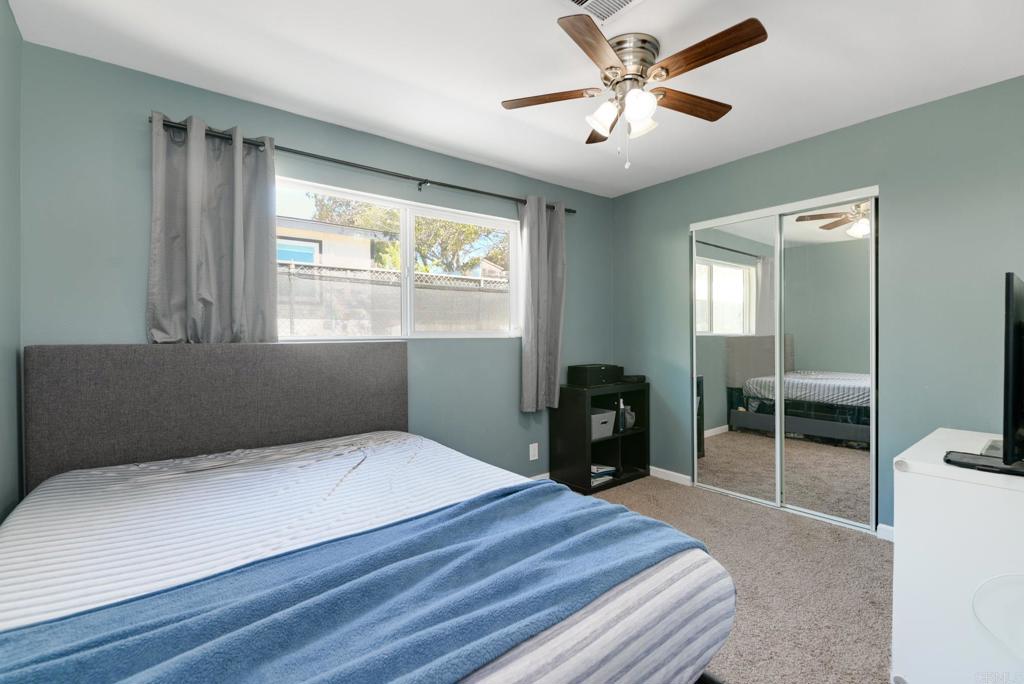611 San Juhn Street Spring Valley, CA 91977 - Photo 18 of 25 a bedroom with a bed and a window
