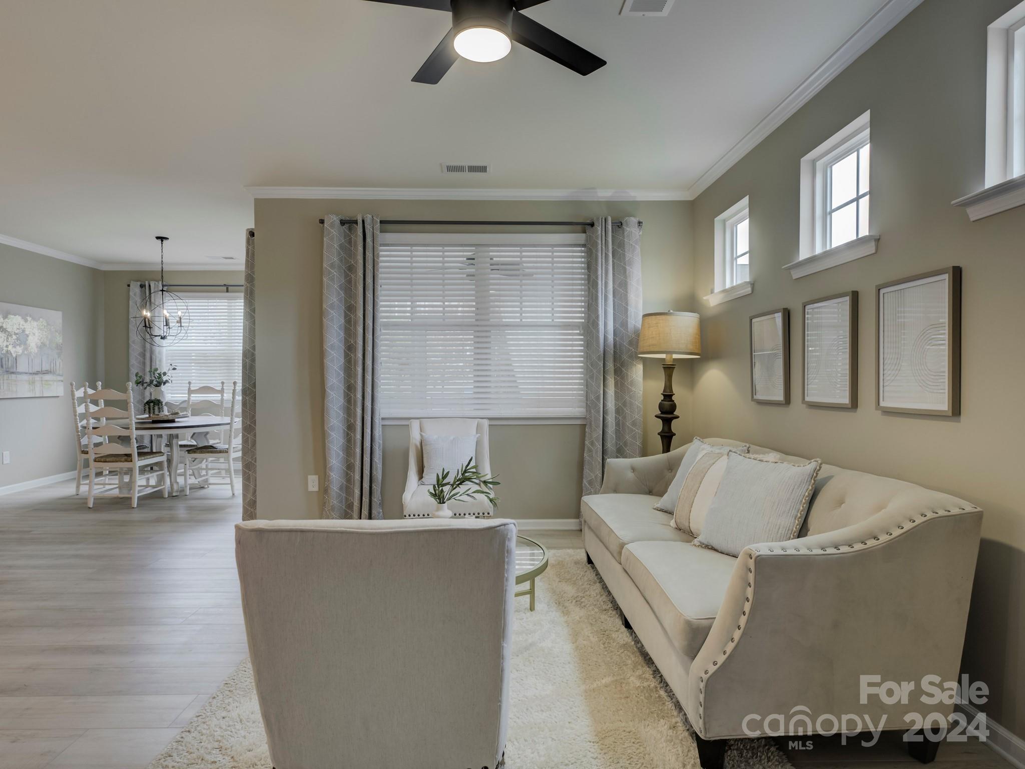 405 Cotton Field Road Indian Land, SC 29707 - Photo 13 of 48 a living room with furniture and a table