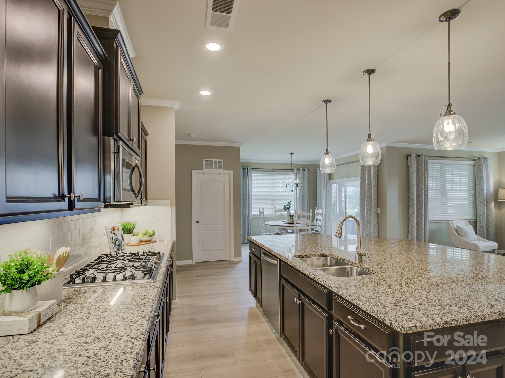 405 Cotton Field Road Indian Land, SC 29707 - Photo 16 of 48 a kitchen with counter top space and sink