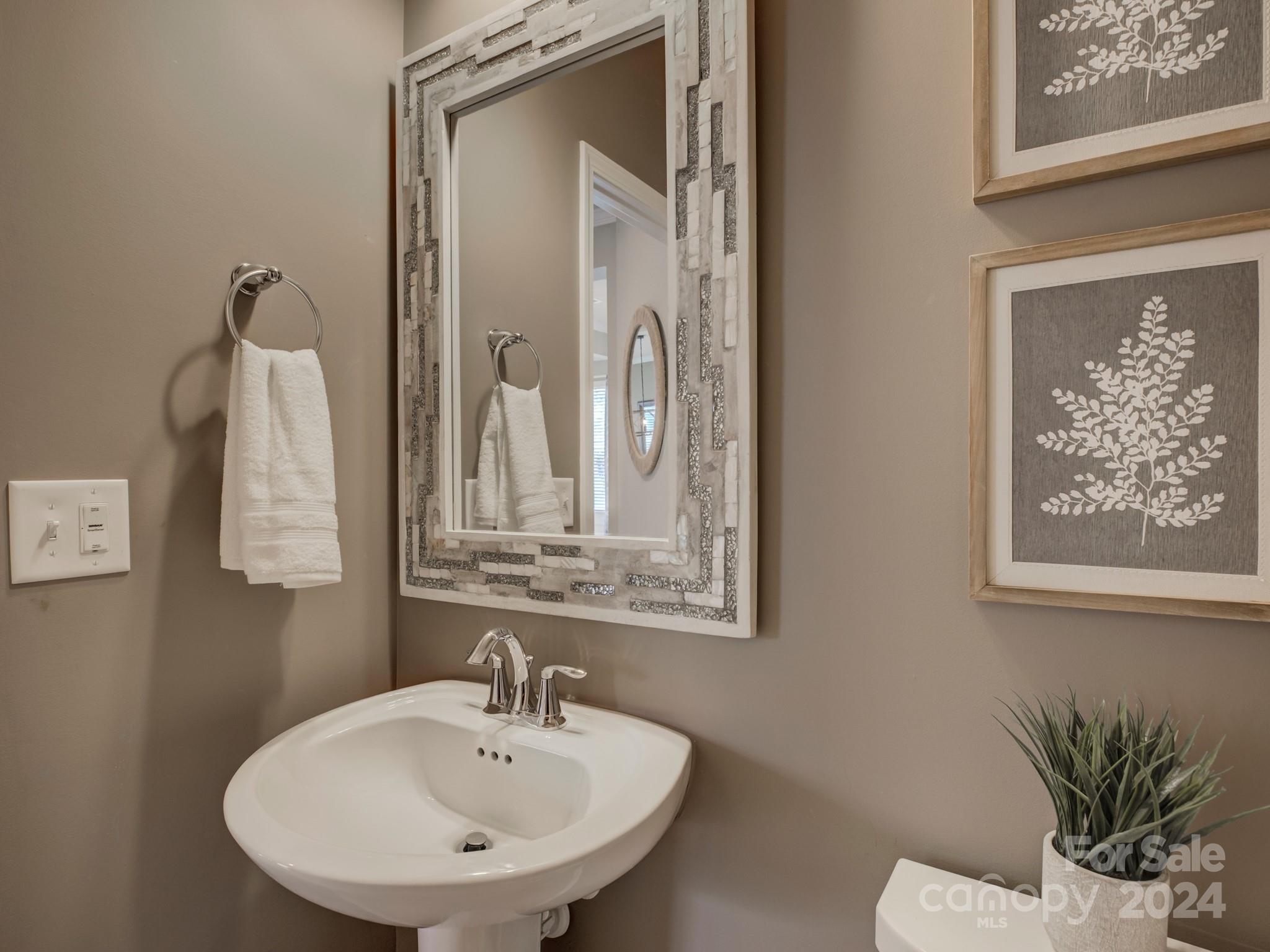 405 Cotton Field Road Indian Land, SC 29707 - Photo 20 of 48 a bathroom with a sink and a mirror