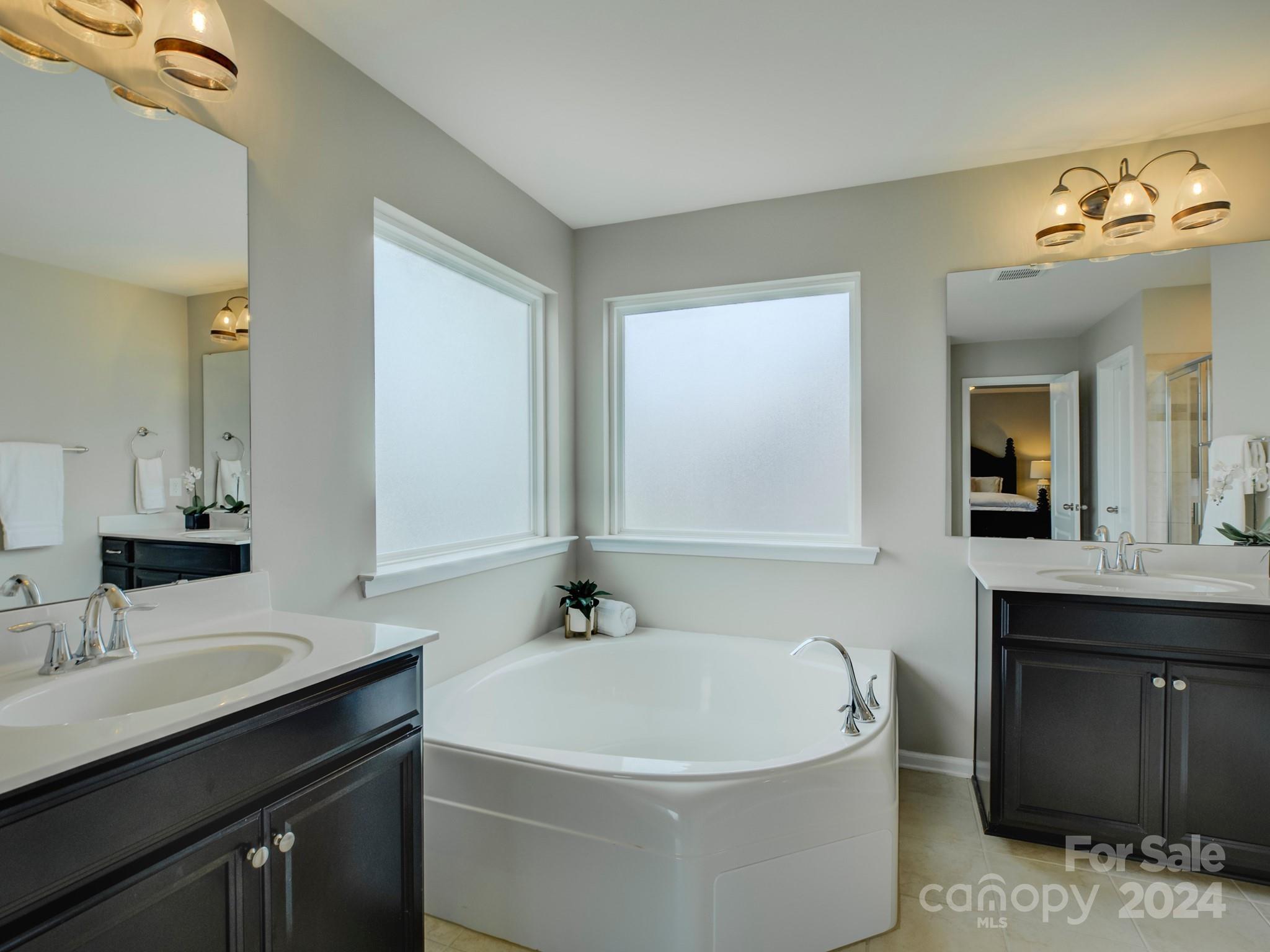 405 Cotton Field Road Indian Land, SC 29707 - Photo 27 of 48 a bathroom with a sink and a mirror