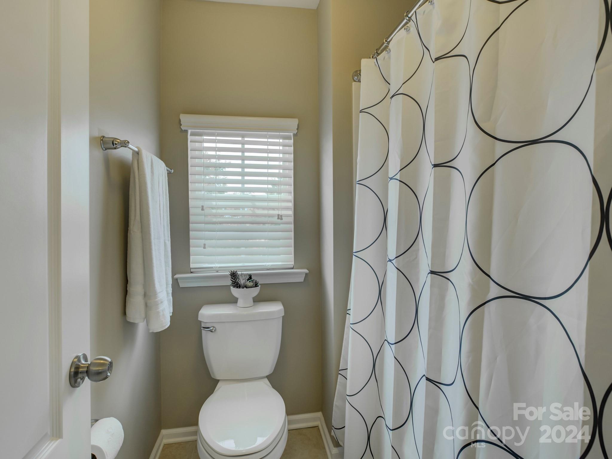 405 Cotton Field Road Indian Land, SC 29707 - Photo 33 of 48 a bathroom with a toilet and a sink