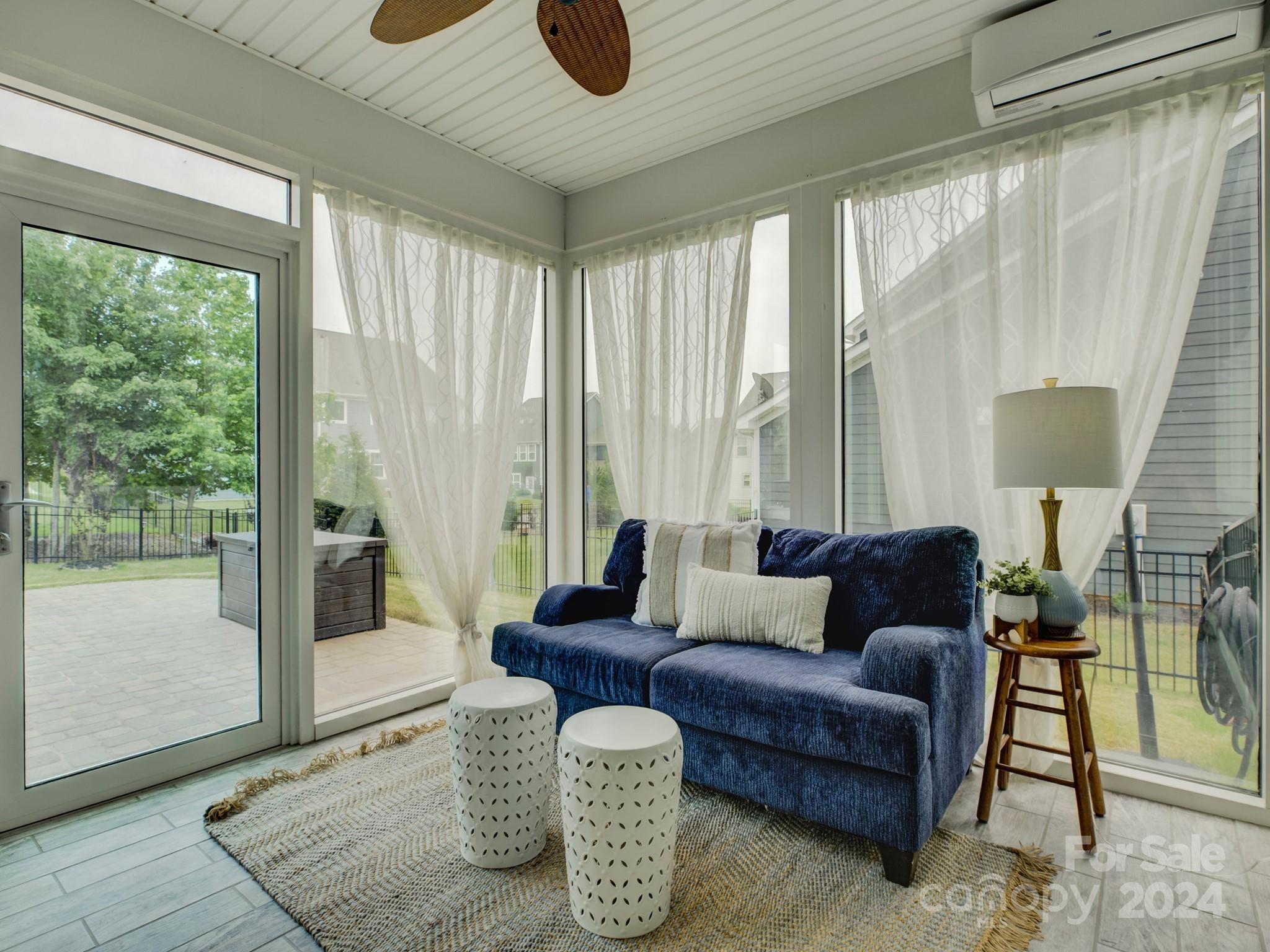 405 Cotton Field Road Indian Land, SC 29707 - Photo 38 of 48 a living room with furniture and a large window