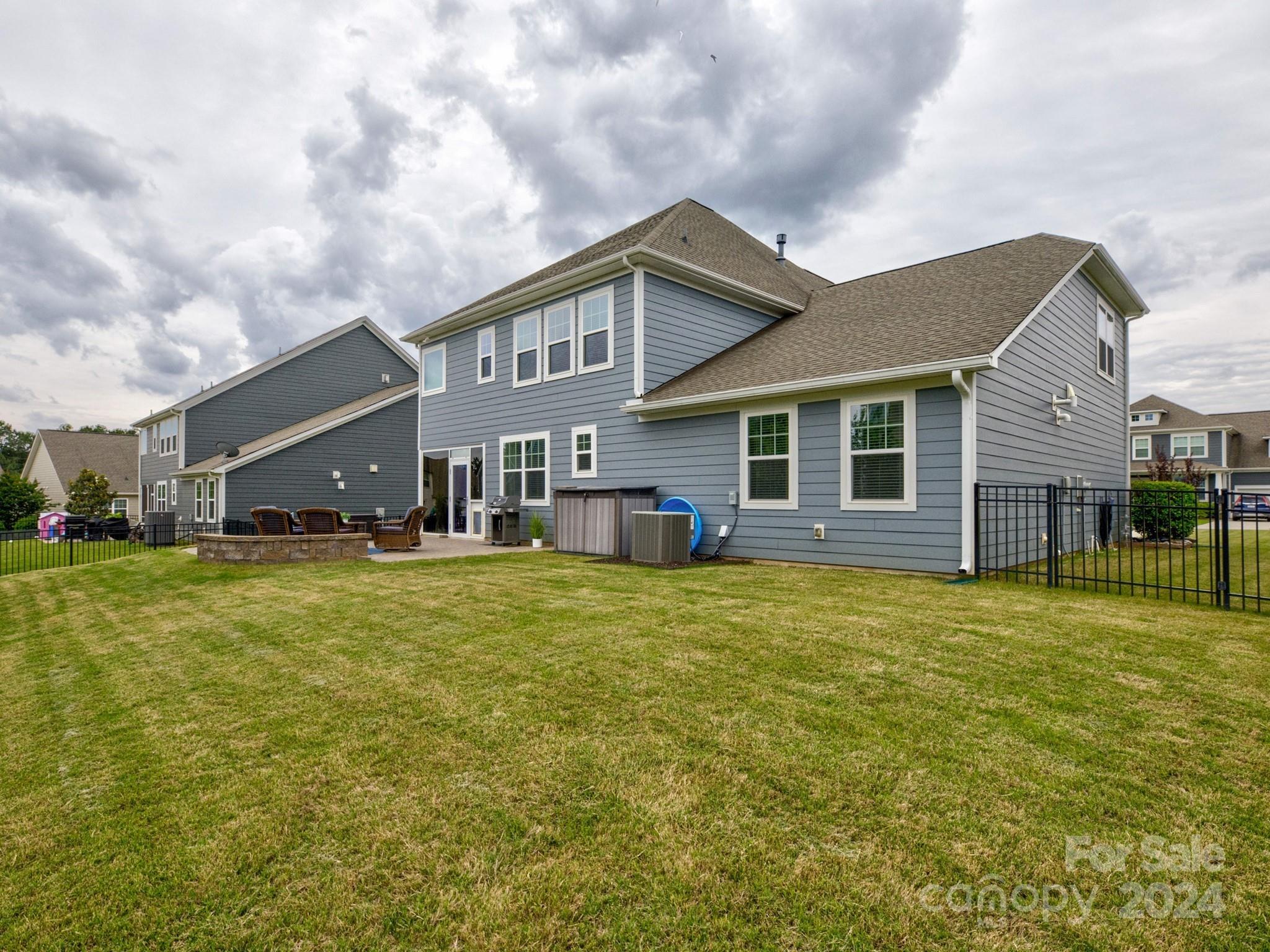 405 Cotton Field Road Indian Land, SC 29707 - Photo 43 of 48 a front view of a house with a garden