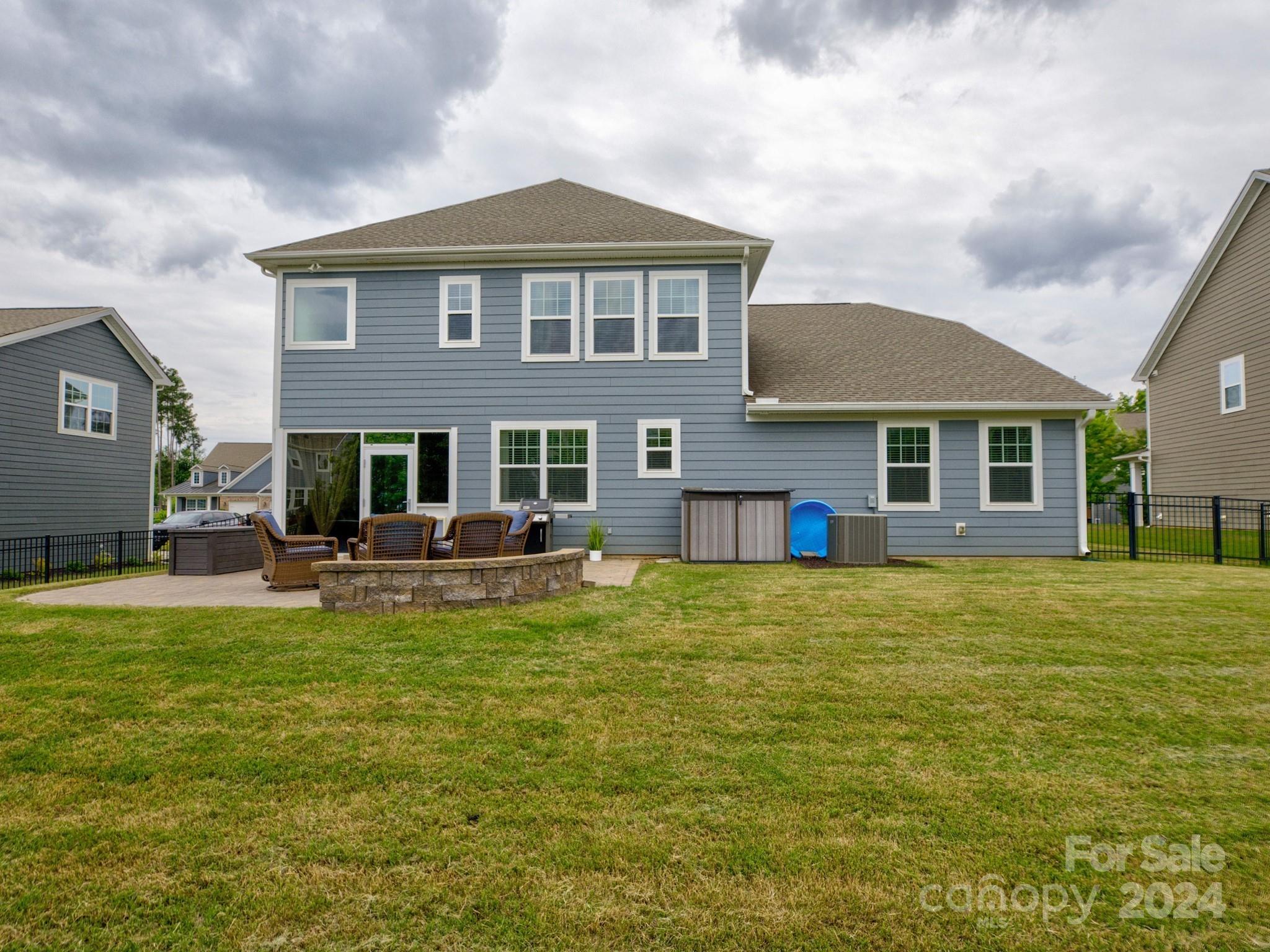 405 Cotton Field Road Indian Land, SC 29707 - Photo 44 of 48 a front view of a house with a garden