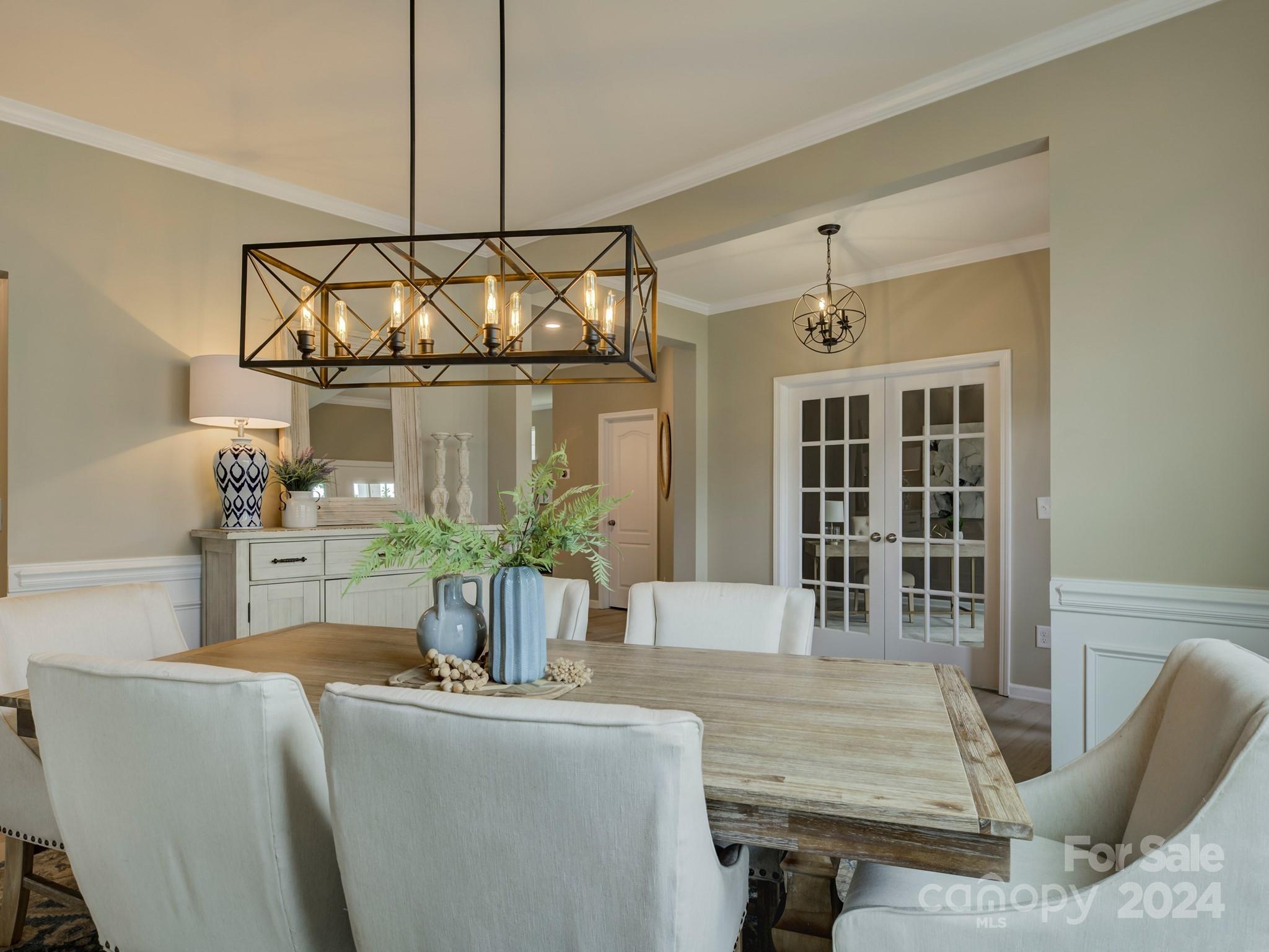 405 Cotton Field Road Indian Land, SC 29707 - Photo 6 of 48 a dining room view with a glass top table and chairs