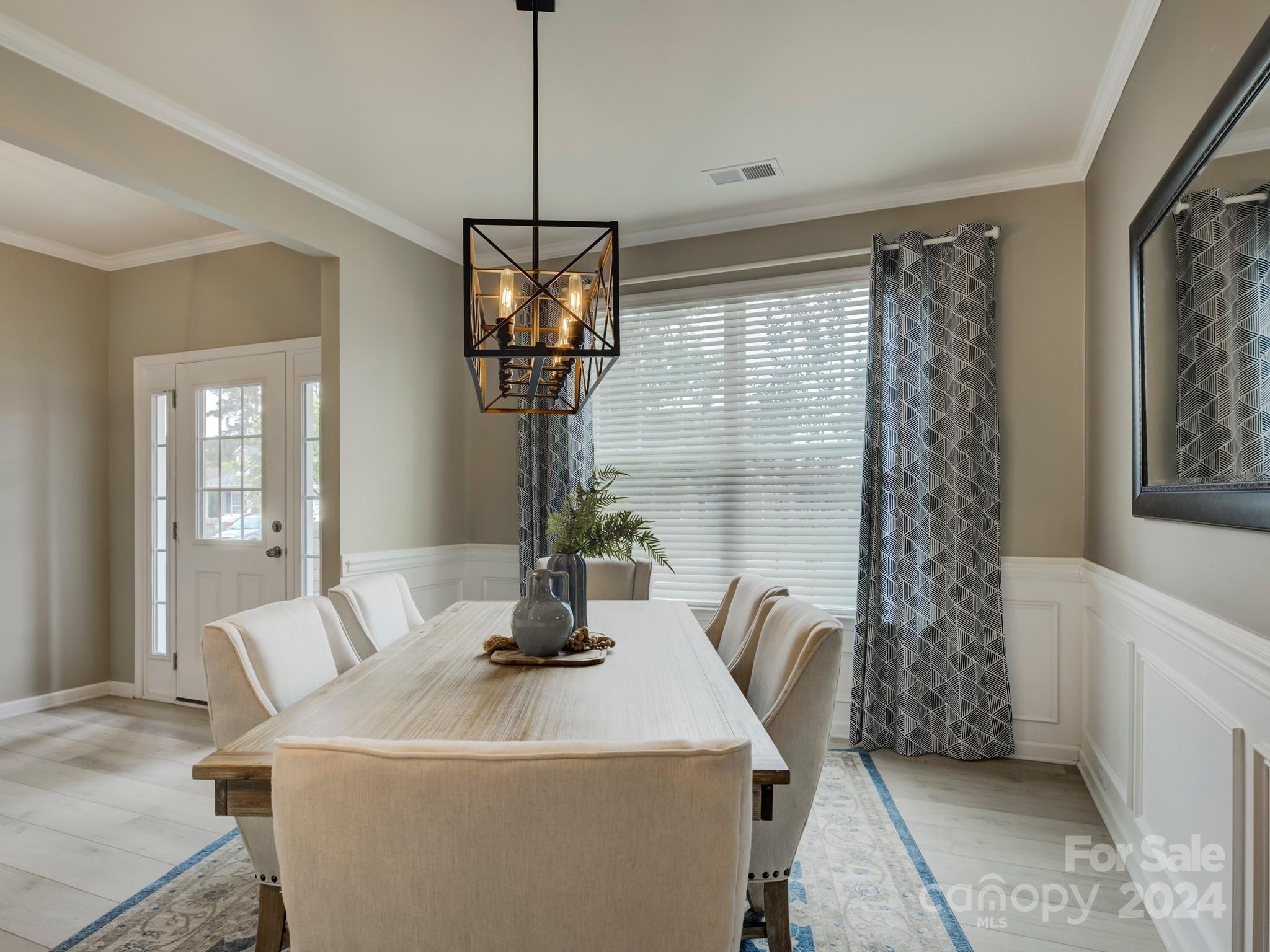 405 Cotton Field Road Indian Land, SC 29707 - Photo 7 of 48 a dining room with a chandelier