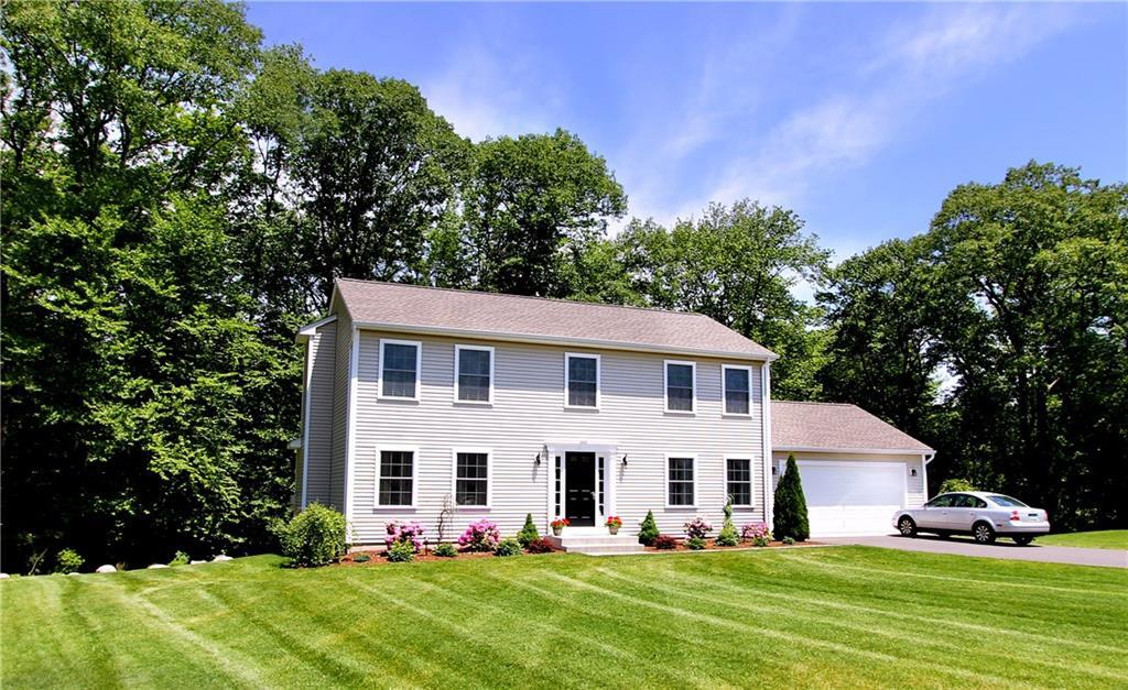 16 Gay Bower Road Monroe, CT 06468 - Photo 1 of 1 a front view of house with yard and green space