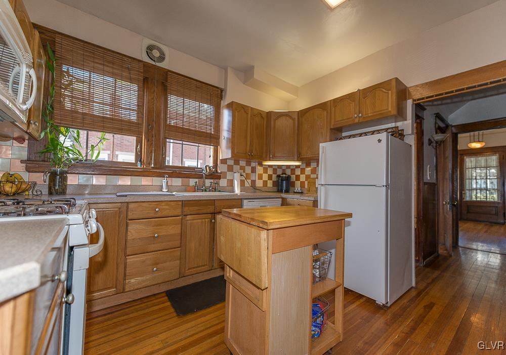 2640 Nazareth Road Easton, PA 18045 - Photo 8 of 23 Kitchen with hallway leading to powder room and gr