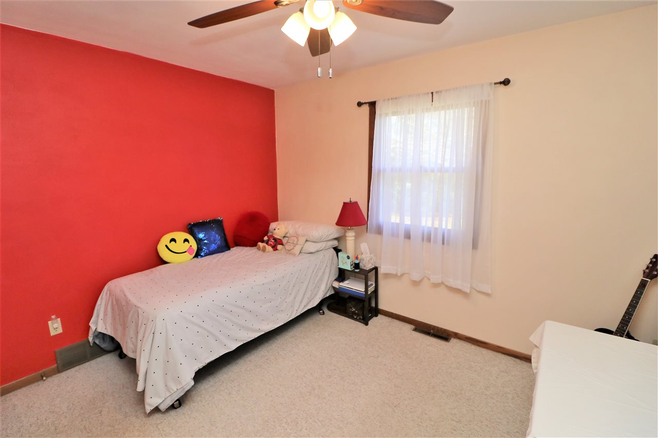 16214 Anderson Road Davis, IL 61019 - Photo 17 of 27 a bed room with a bed and a window