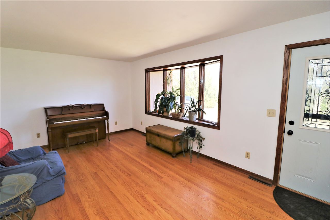 16214 Anderson Road Davis, IL 61019 - Photo 3 of 27 a living room with furniture and a window