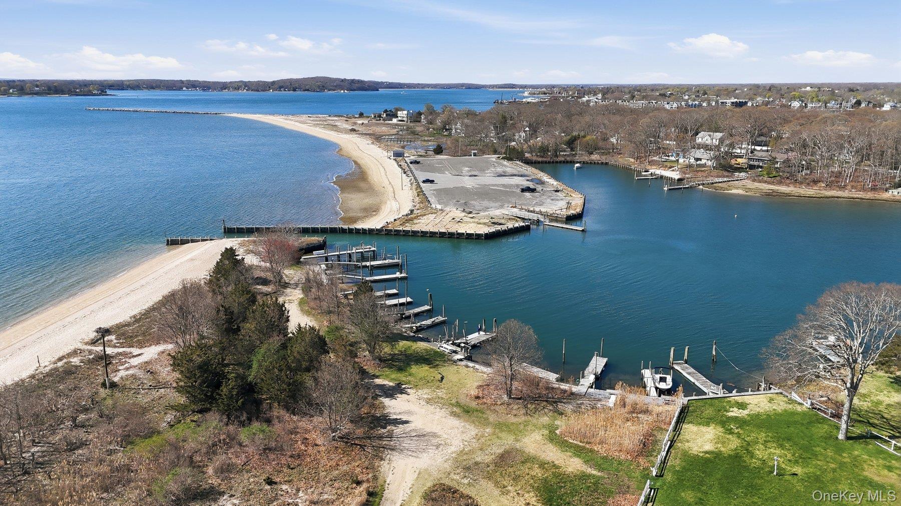 145 Osprey Nest Road Greenport, NY 11944 - Photo 34 of 40 Aerial View of Community Beach, Dock and the Peconic Bay