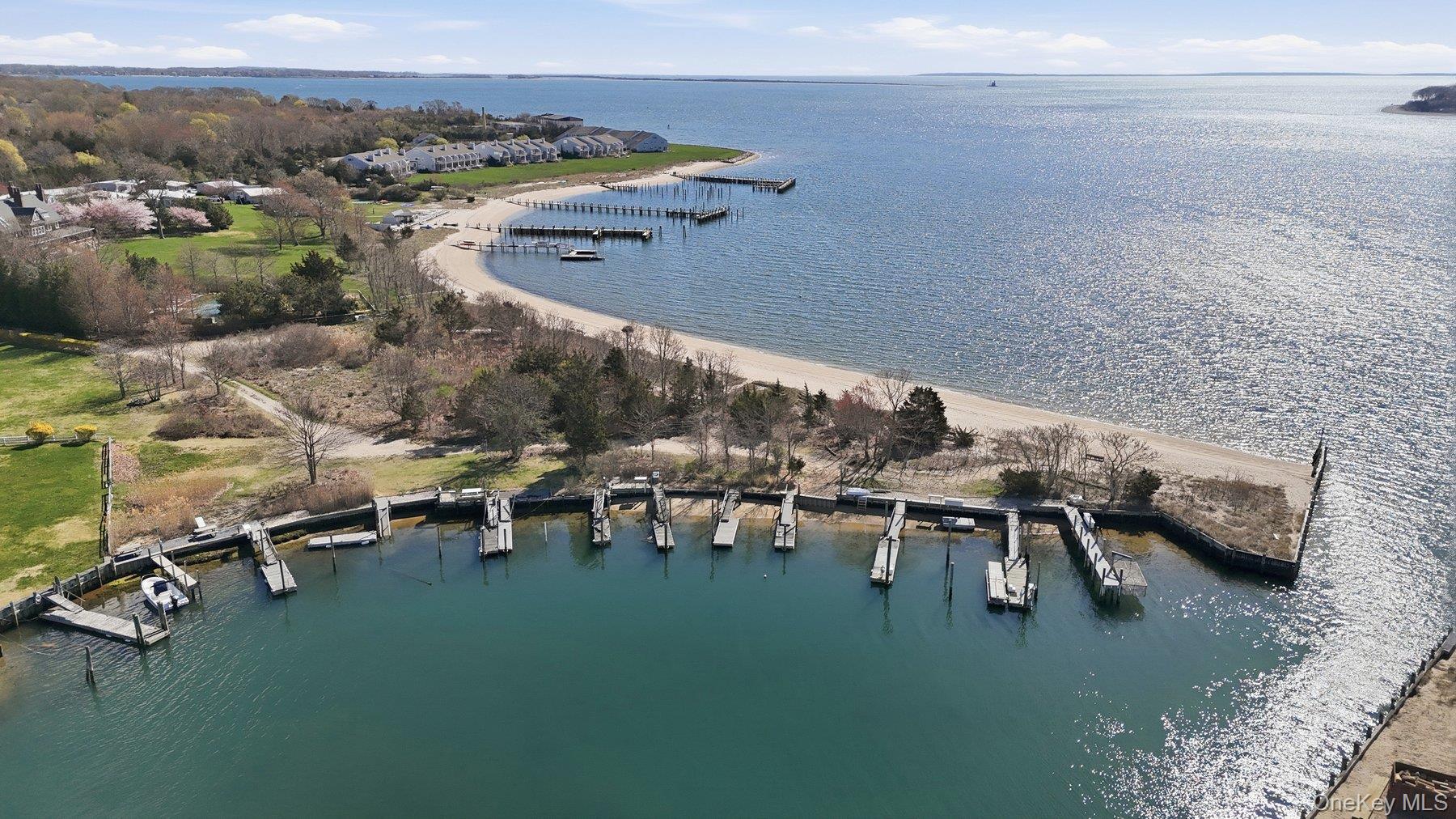 145 Osprey Nest Road Greenport, NY 11944 - Photo 35 of 40 Aerial View of Community Beach, Dock and the Peconic Bay