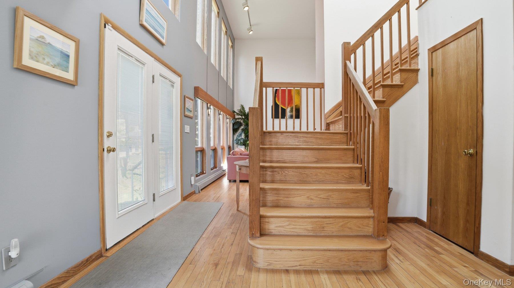 145 Osprey Nest Road Greenport, NY 11944 - Photo 6 of 40 Foyer and Stairwell