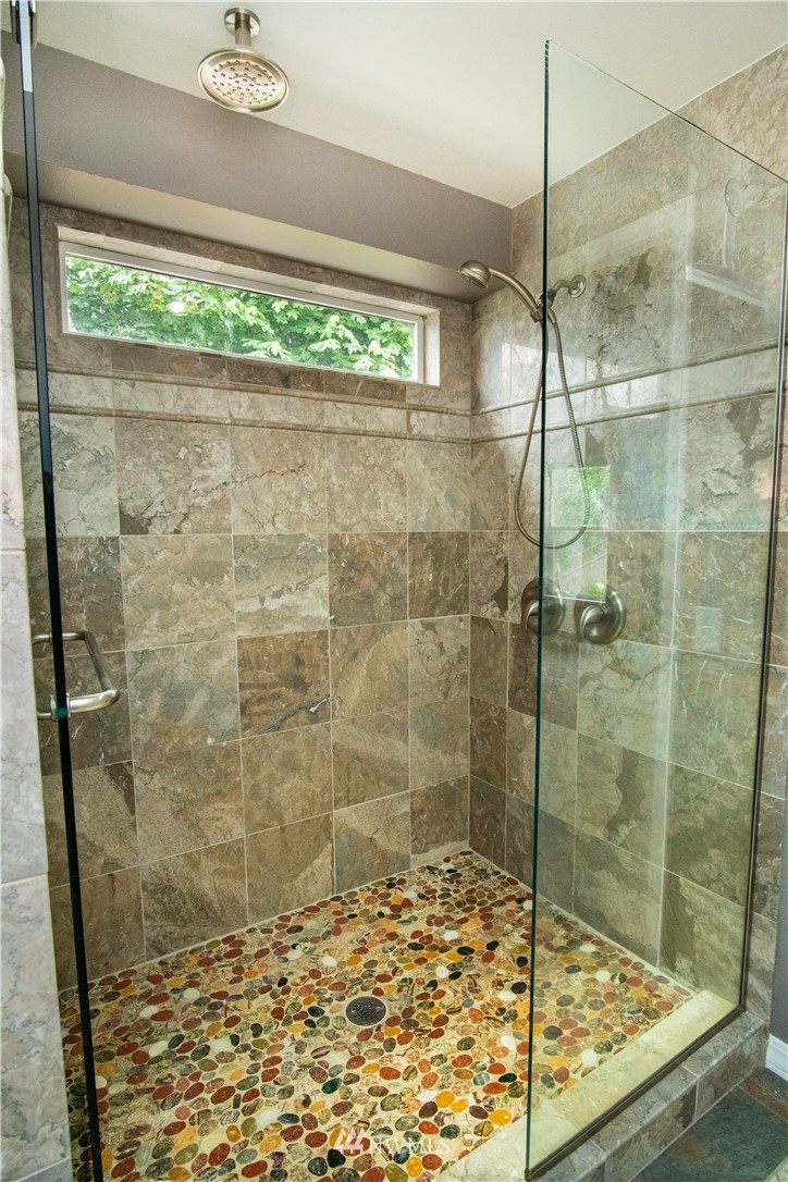 7215 South Rustic Road Seattle, WA 98178 - Photo 25 of 32 a bathroom with a shower
